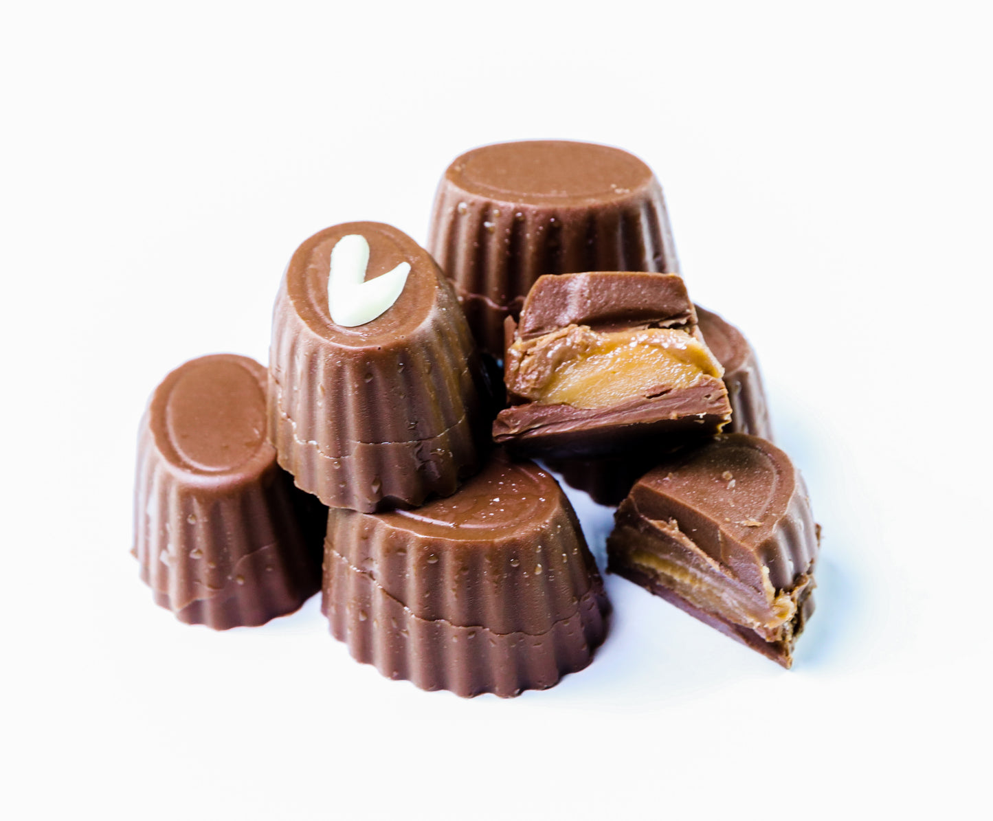 Bonbon Sinasappel-witte chocolade ganache en Karamel (per 10 stuks)